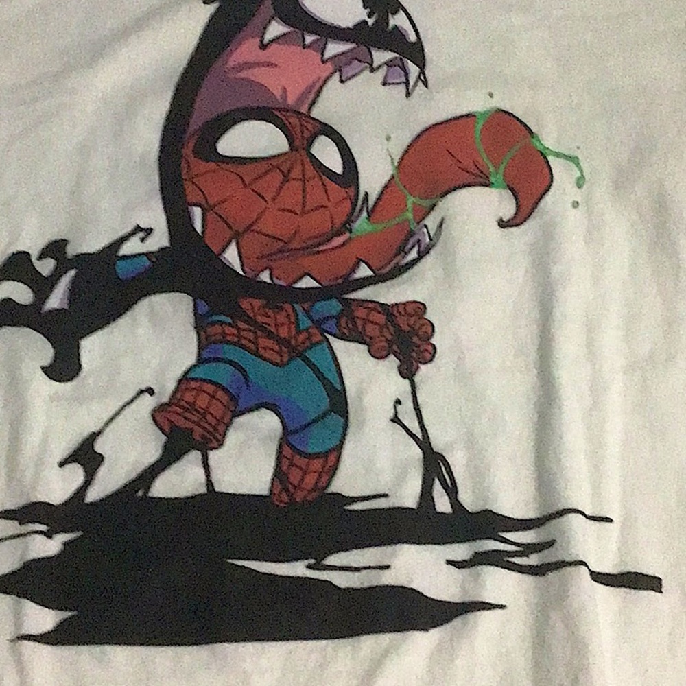 Cotten t-shirt with a colorful depiction of Spider-Man in vivid reds & blacks.